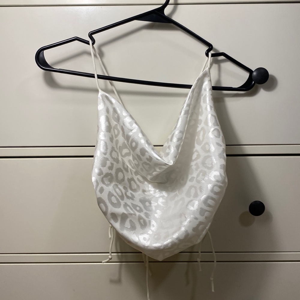 White leopard going out top